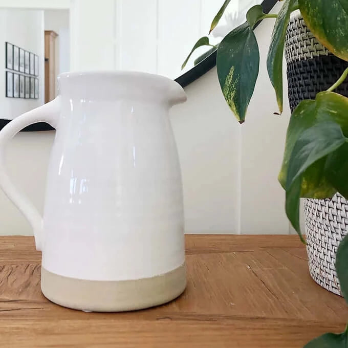 ceramic pitcher with painting