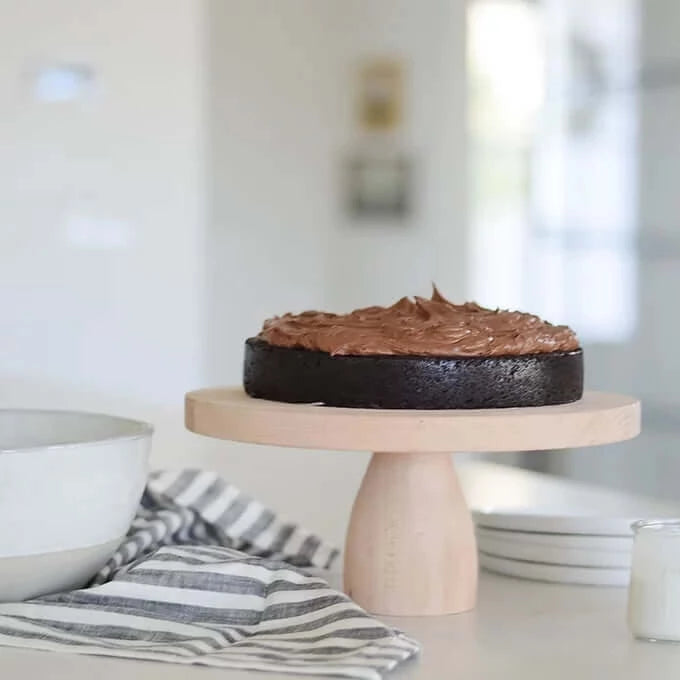 wood cake stand with bowls stacked